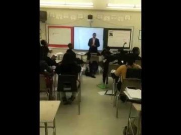 Students From KIPP Academy Baltimore Salute Banking On Our Future Instructor