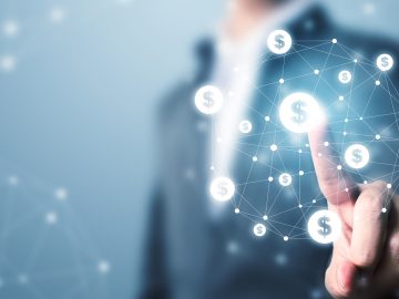 Financial technology (Fin-tech). Businessman pointing dollar currency icon. Concept online transaction application for ecommerce and internet investment